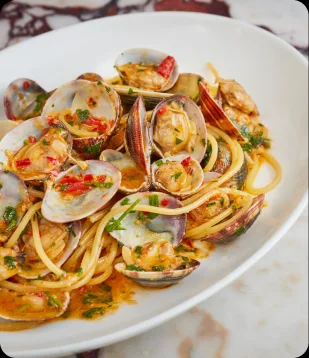 Handmade pasta and Italian wine at the AI Edge Table dinner