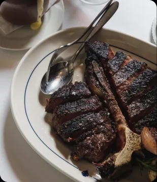 A sliced dry-aged steak at Jeffrey's, Austin