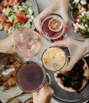 Mezze and cocktails shared across the table at LÝRA