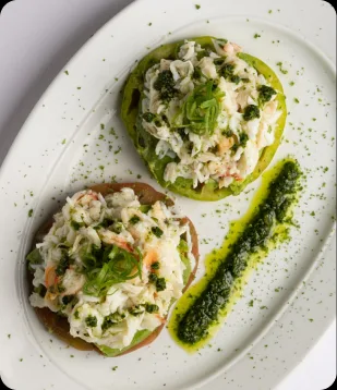 A crab appetizer with herb oil at Steak 48