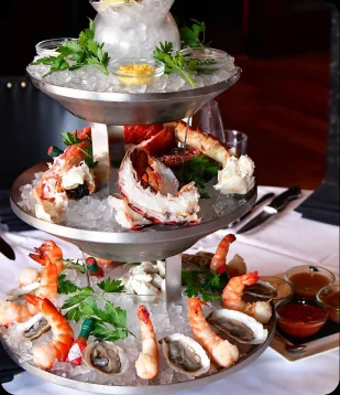 A seafood tower and cocktails at Del Frisco's, Center City